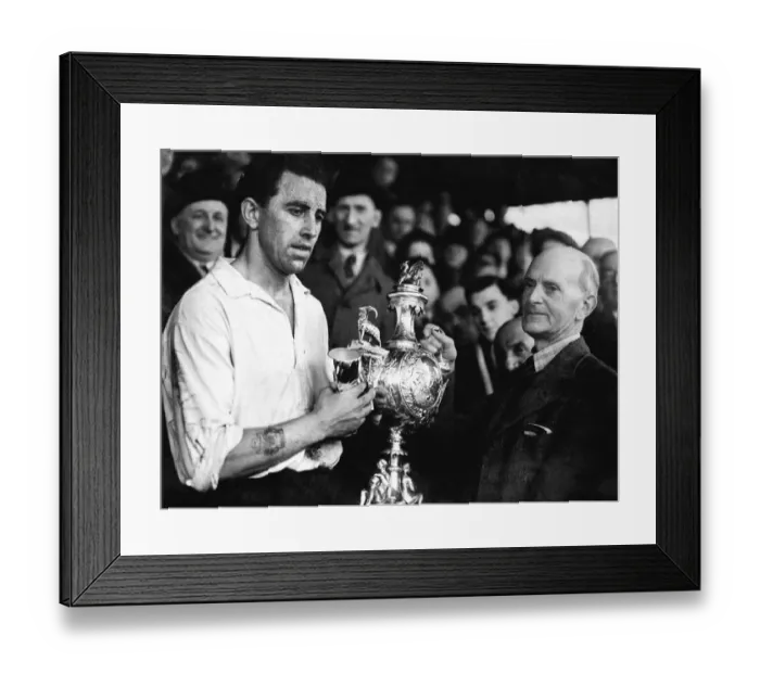 Framed Print : PICTURE SHOWS: Mr E. J. Morgan (vice-president) presenting the Welsh Cup to Roy Paul