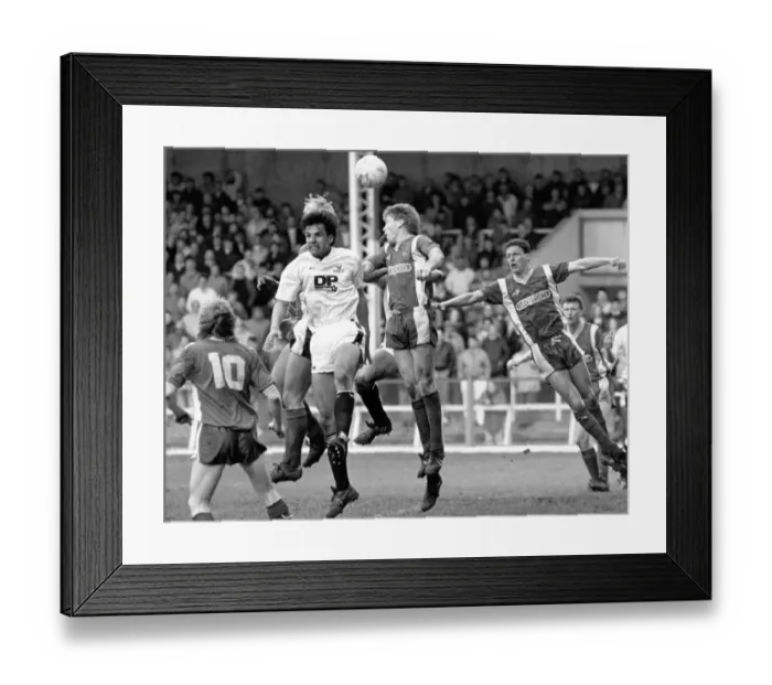 Framed Print : Sport - Football - Swansea City - -Swansea defender Chris Coleman jumps under pressure