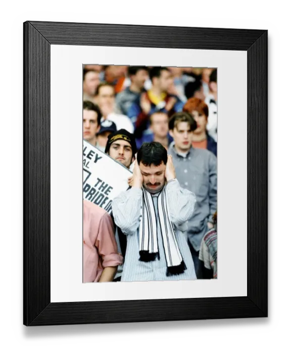 Framed Print : Sport - Football - Swansea City - A Swans fan shows is despair after his team lost in Framed Print : Sport - Football - Swansea City - A Swans fan shows is despair after his team lost in