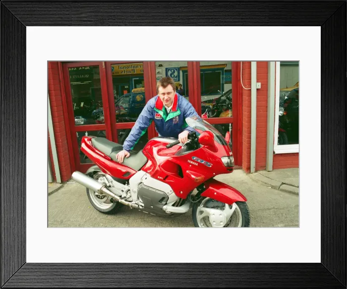 Framed Print : Gary Jordinson of Tillsons motor cycle shop, Stockton, with the Yamaha GTS 1000