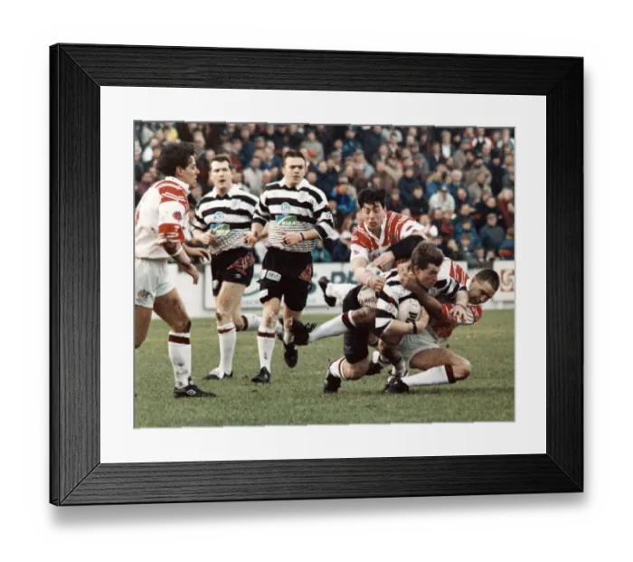 Framed Print : Saints v Widnes Rugby match - John Devereaux well taken out by Paul Loughlin