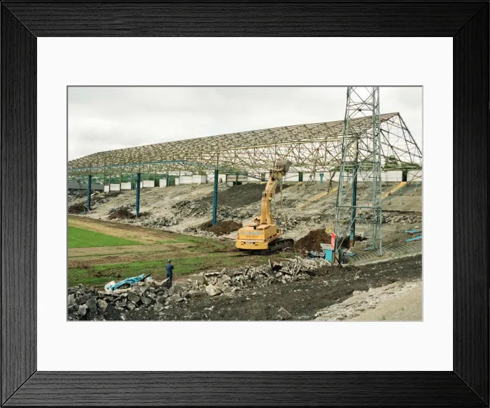 Framed Print : Town stand coming down at Leeds Road, the former ground for Huddersfield Town F. C Framed Print : Town stand coming down at Leeds Road, the former ground for Huddersfield Town F. C