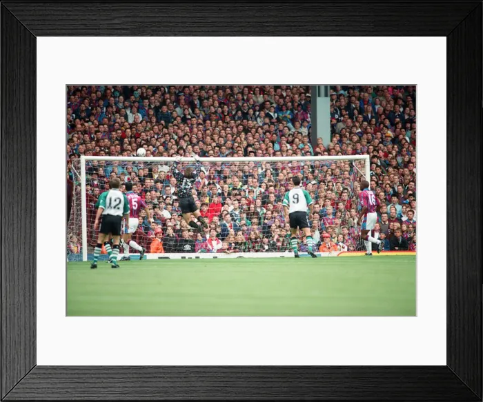 Framed Print : Fans in the Holte End stand in the final game before it was demolished Framed Print : Fans in the Holte End stand in the final game before it was demolished