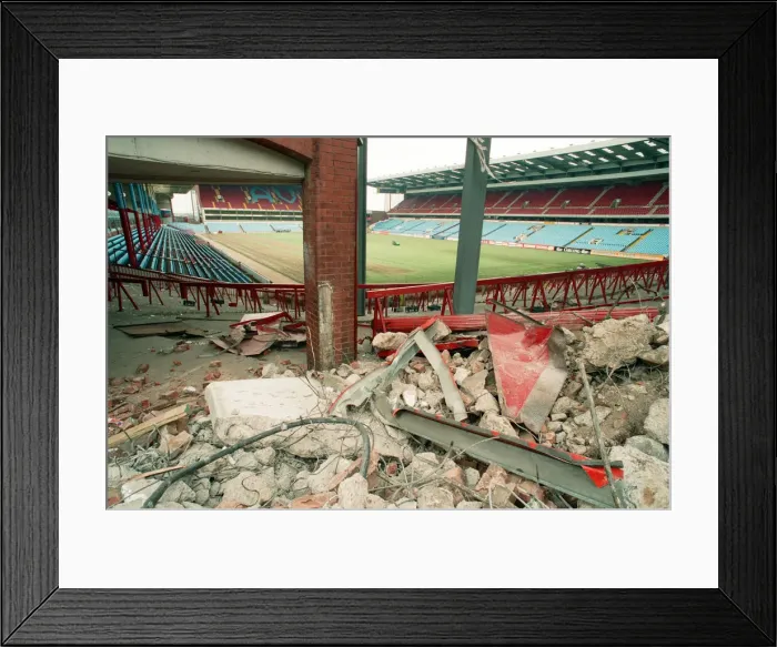 Framed Print : The Holte End stand at Villa Park is demolished by workmen. 10th May 1994 Framed Print : The Holte End stand at Villa Park is demolished by workmen. 10th May 1994