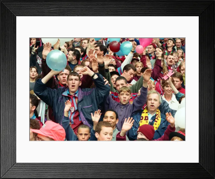 Framed Print : Fans in the Holte End stand in the final game before it was demolished Framed Print : Fans in the Holte End stand in the final game before it was demolished