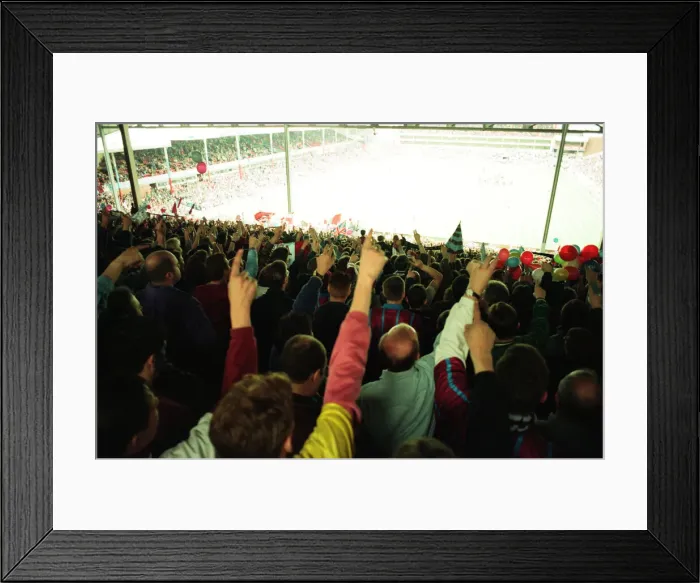 Framed Print : Fans in the Holte End stand in the final game before it was demolished Framed Print : Fans in the Holte End stand in the final game before it was demolished