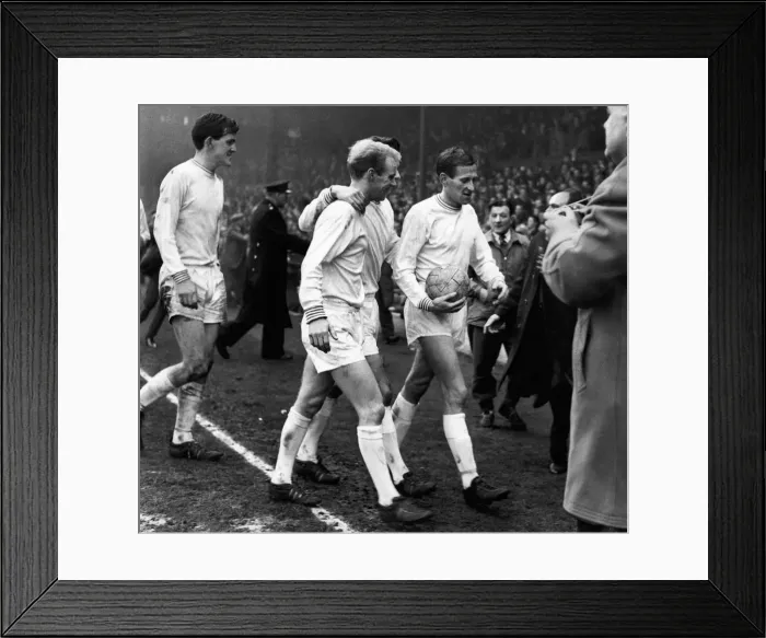 Framed Print : Sport - Football - Swansea Town - Swansea players leave the field at Anfield after their Framed Print : Sport - Football - Swansea Town - Swansea players leave the field at Anfield after their
