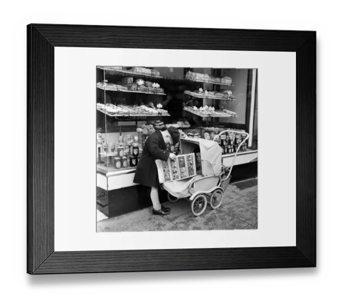 Framed Print : Little boy waits for his mother outside the Bakers shop in Stratford-upon-Avon Framed Print : Little boy waits for his mother outside the Bakers shop in Stratford-upon-Avon