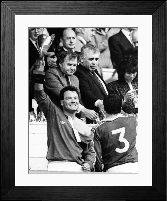 Framed Print : Welsh Rugby Union Final - Llanelli 28 - 13 Neath. Scarlet try star Ieuan Evans lifts Framed Print : Welsh Rugby Union Final - Llanelli 28 - 13 Neath. Scarlet try star Ieuan Evans lifts