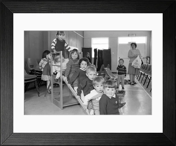 Framed Print : Life was full of ups and downs for these youngsters at St Thomas Church mother Framed Print : Life was full of ups and downs for these youngsters at St Thomas Church mother