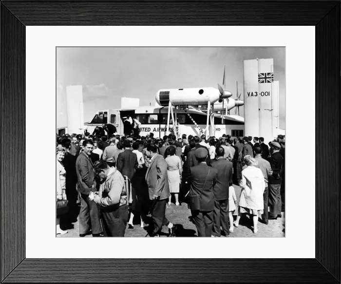 Framed Print : A Hovercoach surrounded by a big crowd at Leasowe, Wirral, Merseyside. 20th July 1962 Framed Print : A Hovercoach surrounded by a big crowd at Leasowe, Wirral, Merseyside. 20th July 1962