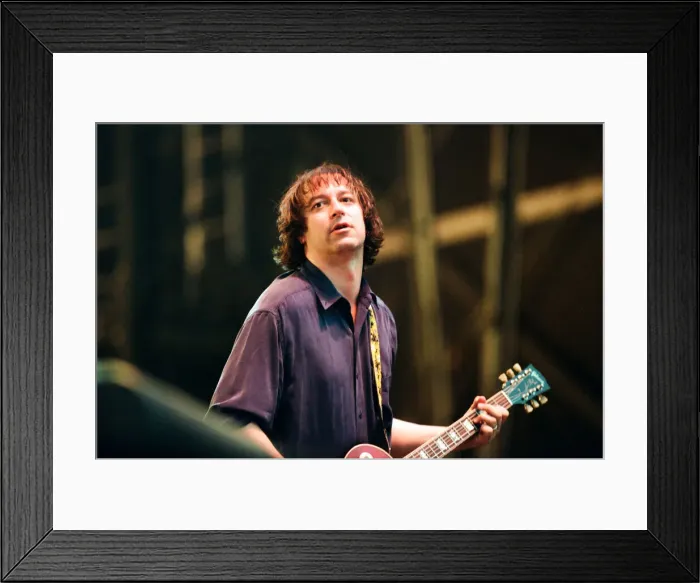 Framed Print : Peter Buck, R. E. M. in concert at the Galpharm Stadium. 25th July 1995 Framed Print : Peter Buck, R. E. M. in concert at the Galpharm Stadium. 25th July 1995