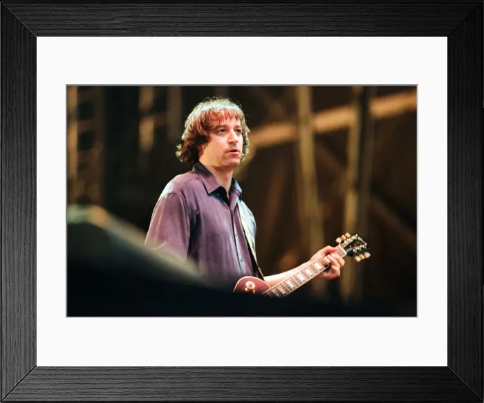 Framed Print : Peter Buck, R. E. M. in concert at the Galpharm Stadium. 25th July 1995 Framed Print : Peter Buck, R. E. M. in concert at the Galpharm Stadium. 25th July 1995