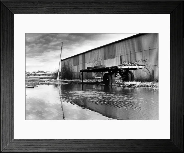 Framed Print : Derelict dockland area with Garston in the background. Garston is a district of Liverpool