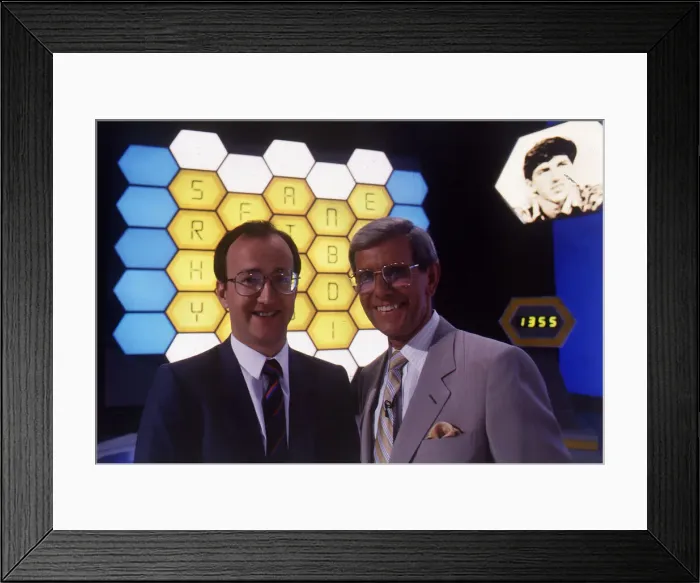 Framed Print : Filming of the television quiz show Blockbusters, hosted by Bob Holness (right) Framed Print : Filming of the television quiz show Blockbusters, hosted by Bob Holness (right)