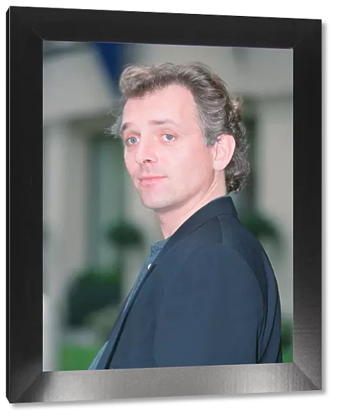 Rik Mayall who plays the Conservative MP Alan B Stard in the TV situation comedy The