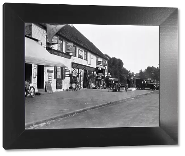 Shops and garage on the Oxford Road, by Old Mill, Denham, Buckinghamshire, Circa 1929