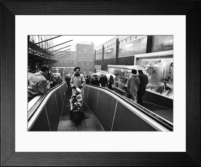 Framed Print : A new moving pavement in Leeds, West Yorkshire. 24th March 1964 Framed Print : A new moving pavement in Leeds, West Yorkshire. 24th March 1964