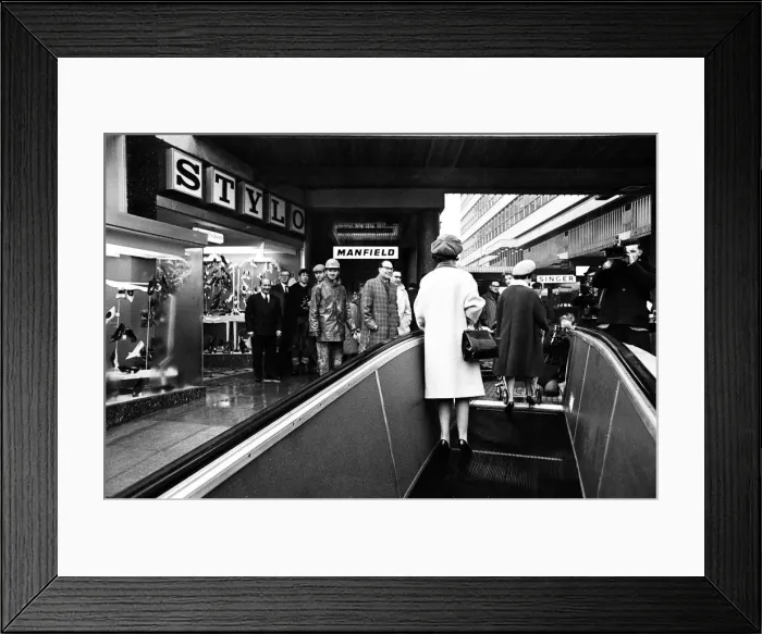 Framed Print : A new moving pavement in Leeds, West Yorkshire. 24th March 1964 Framed Print : A new moving pavement in Leeds, West Yorkshire. 24th March 1964