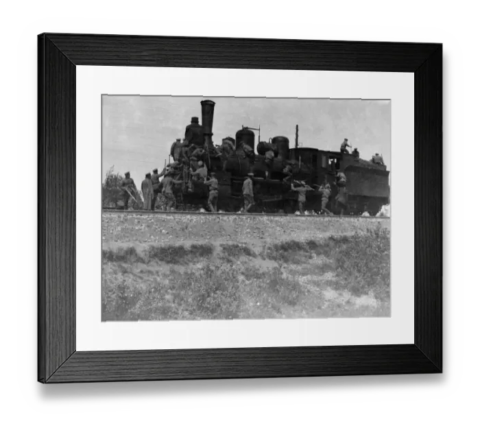 Framed Print : Russian army sappers hastily manager to secure standing room only on a locomotive