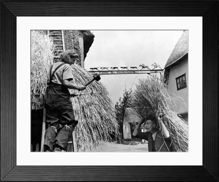 Framed Print : 17 year old girl and father rethatch a village. Quite a big job for 17 year old Joyce Framed Print : 17 year old girl and father rethatch a village. Quite a big job for 17 year old Joyce