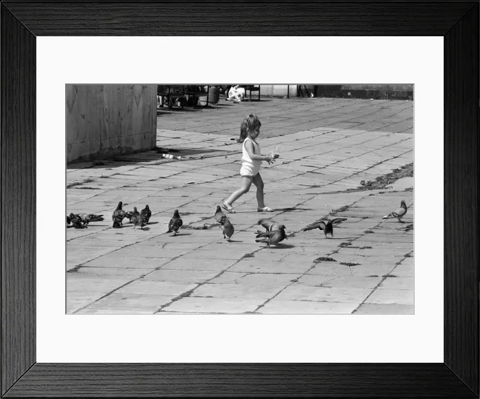 Framed Print : Pier Head, Liverpool, Merseyside, 17th August 1988. Young child plays with pigeons Framed Print : Pier Head, Liverpool, Merseyside, 17th August 1988. Young child plays with pigeons