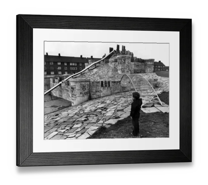 Framed Print : A child looking at a £22000 playground in Speke, Liverpool dubbed by local children Framed Print : A child looking at a £22000 playground in Speke, Liverpool dubbed by local children