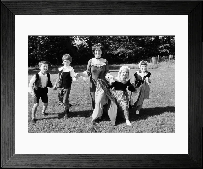 Framed Print : Stepping out in time... These youngsters from Helme Junior