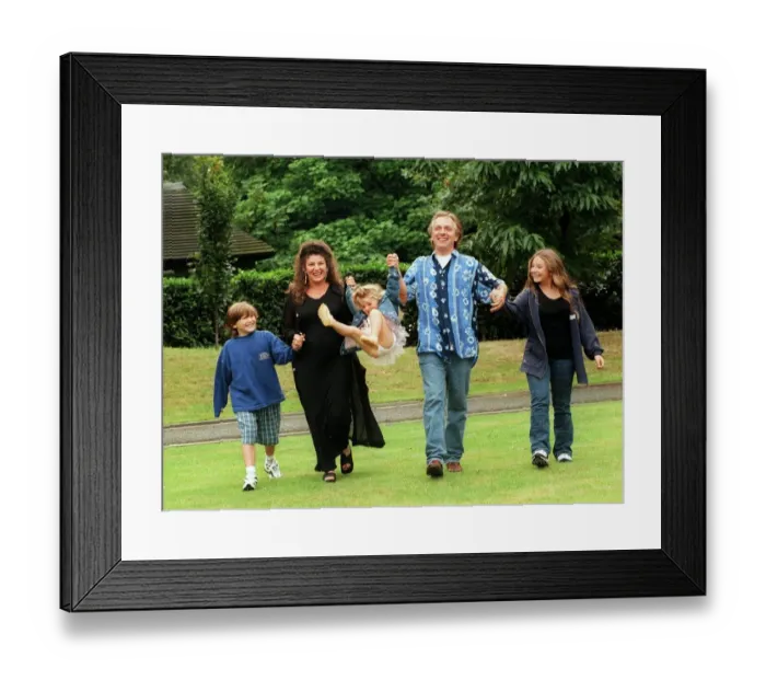 Framed Print : Comedian Rik Mayall with his family, wife Barbara and three children, Rosie