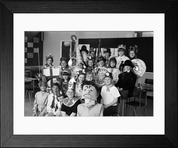 Framed Print : Dragon Slayers at Bradley Junior School put on a production of a traditional English play Framed Print : Dragon Slayers at Bradley Junior School put on a production of a traditional English play