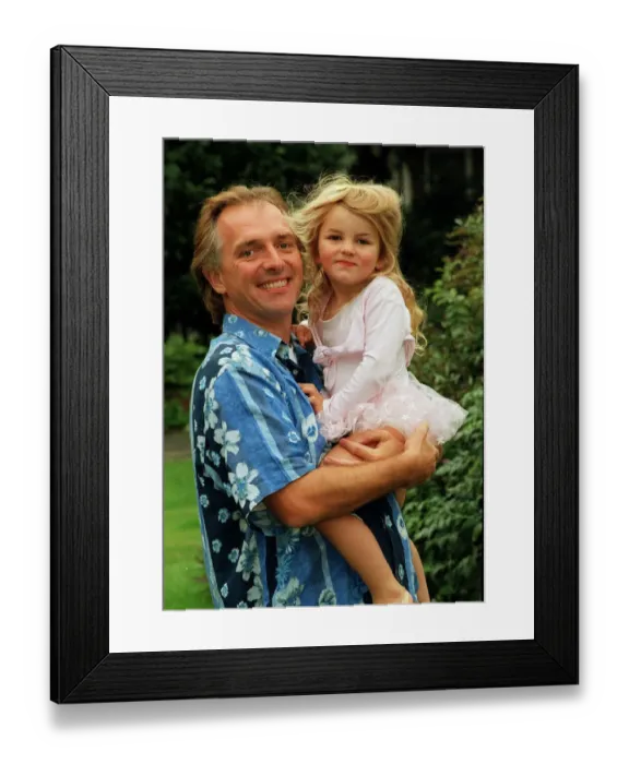 Framed Print : Comedian Rik Mayall with his youngest daughter Bonnie. 12th September 1998 Framed Print : Comedian Rik Mayall with his youngest daughter Bonnie. 12th September 1998