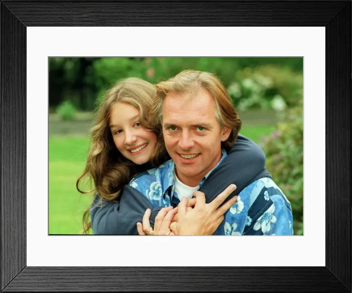 Framed Print : Comedian Rik Mayall with daughter Rosie. 12th September 1998