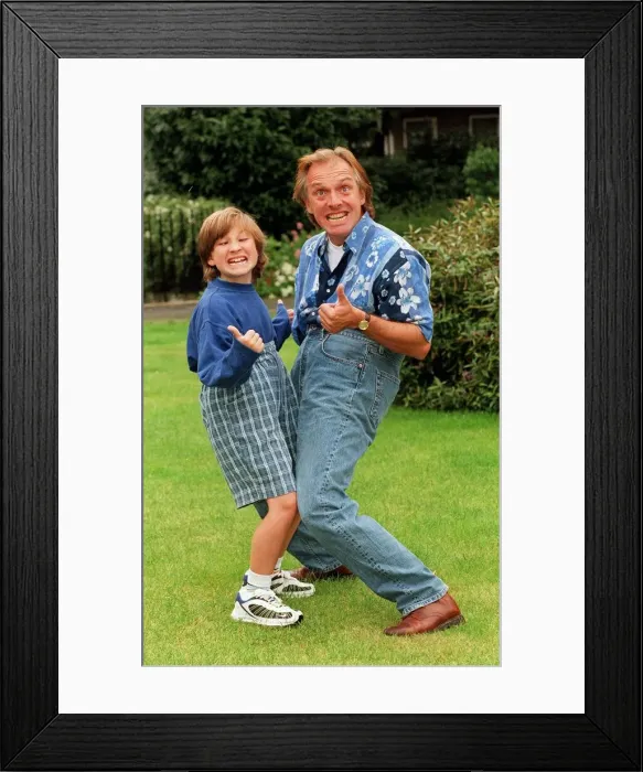 Framed Print : Comedian Rik Mayall and his son Sidney pulling funny faces. 12th September 1998 Framed Print : Comedian Rik Mayall and his son Sidney pulling funny faces. 12th September 1998