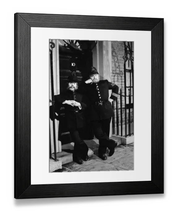 Framed Print : Ronnie Corbett and Ronnie Barker dressed as policemen on duty outside 10 Downing Street