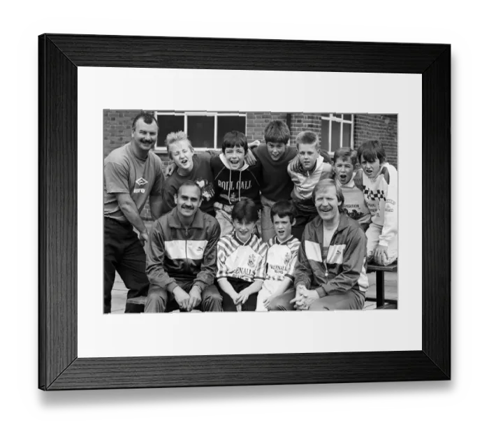 Framed Print : These young boys are eagerly awaiting the Kick-off later this month of the summer evening Framed Print : These young boys are eagerly awaiting the Kick-off later this month of the summer evening
