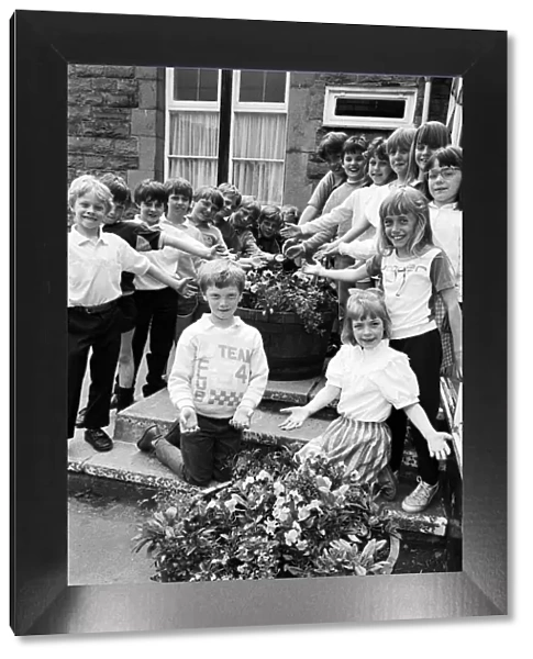 Blossoming out... these budding young gardeners from Denby CofE First School are boosting