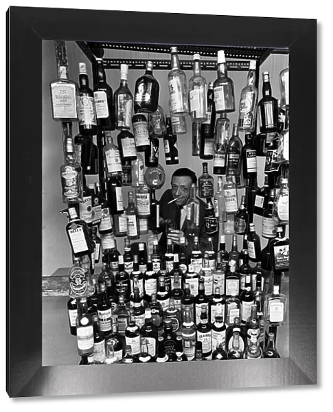 Sunday Mirror writer Stanley Shivas with the 137 best selling Scottish whiskeys