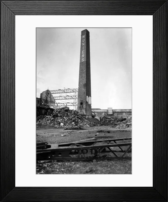 Framed Print : Council engineers have set a weekend deadline for a demolition firm to pull down an old
