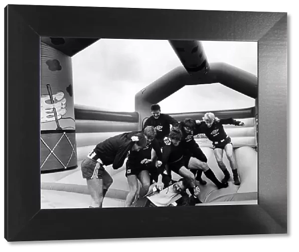 Newcastle United 1986, Pre Season. Players take time out on a inflatable bouncing castle