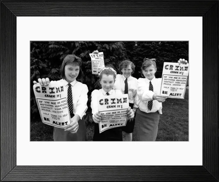 Framed Print : Four fearless crimestoppers have come up with an idea to enlist support for their local Framed Print : Four fearless crimestoppers have come up with an idea to enlist support for their local
