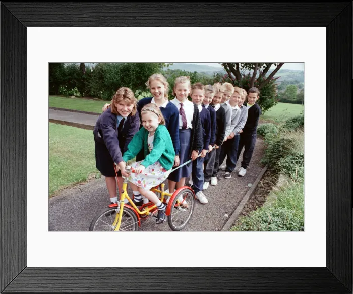 Framed Print : With a little help from my friends... 10-year-old Katy Hardaker is pictured with friends Framed Print : With a little help from my friends... 10-year-old Katy Hardaker is pictured with friends