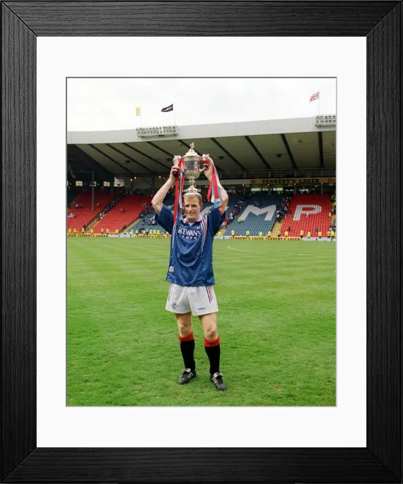 Framed Print : Rangers 5 - 1 Heart of Midlothian. Gordon Durie holds up the Scottish cup after his Framed Print : Rangers 5 - 1 Heart of Midlothian. Gordon Durie holds up the Scottish cup after his