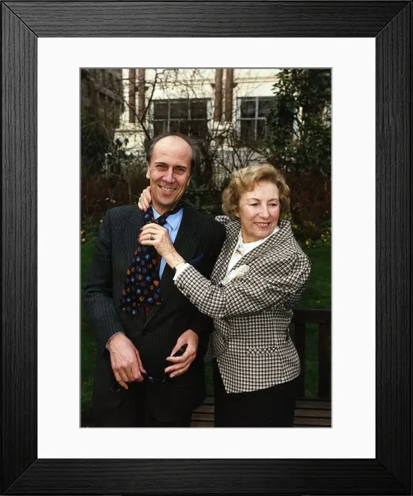 Framed Print : Lord Norman Tebbit with Dame Vera Lynn receives a tie after being named Tiewearer of Framed Print : Lord Norman Tebbit with Dame Vera Lynn receives a tie after being named Tiewearer of