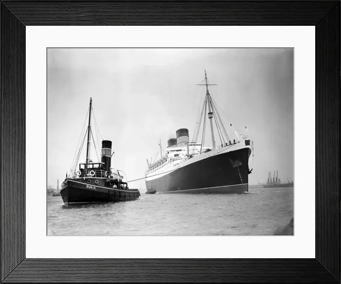 Framed Print : The RMS Mauretania brought up the Thames to King George V Dock at Woolwich Framed Print : The RMS Mauretania brought up the Thames to King George V Dock at Woolwich