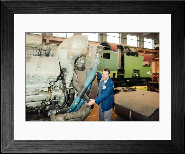 Framed Print : ICI Train Preservation, 4th January 1994. Terry Bye, with one of the two power units of Framed Print : ICI Train Preservation, 4th January 1994. Terry Bye, with one of the two power units of