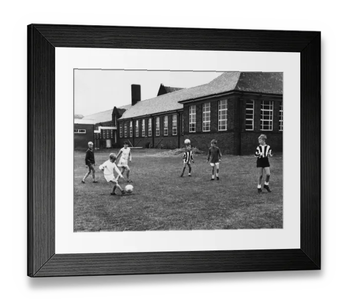 Framed Print : Kids playing a game of Football at Ravenswood Junior School Ravenswood Road