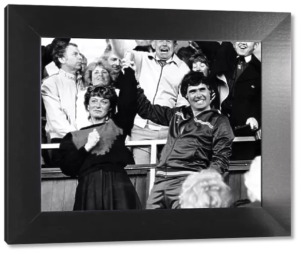 Bobby Gould and his wife accept the fans acclaim at a Coventry v Norwich football match
