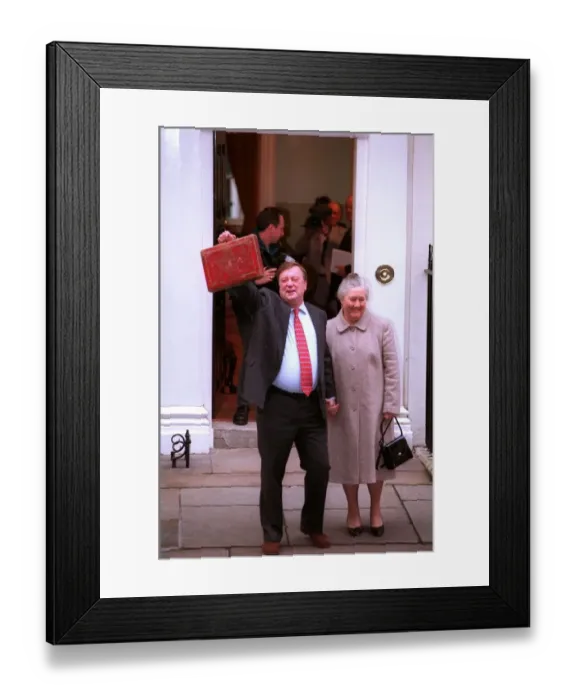 Framed Print : Kenneth Clarke MP chancelor of the exchequer with his wife Gillian Clarke stand outside Framed Print : Kenneth Clarke MP chancelor of the exchequer with his wife Gillian Clarke stand outside
