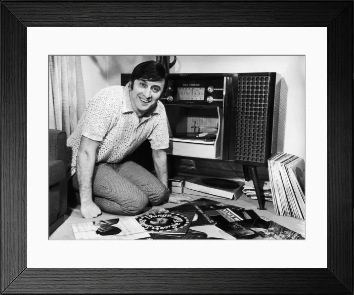 Framed Print : Singer Vince Hill seen here looking through his record collection at home. 3rd March 1967