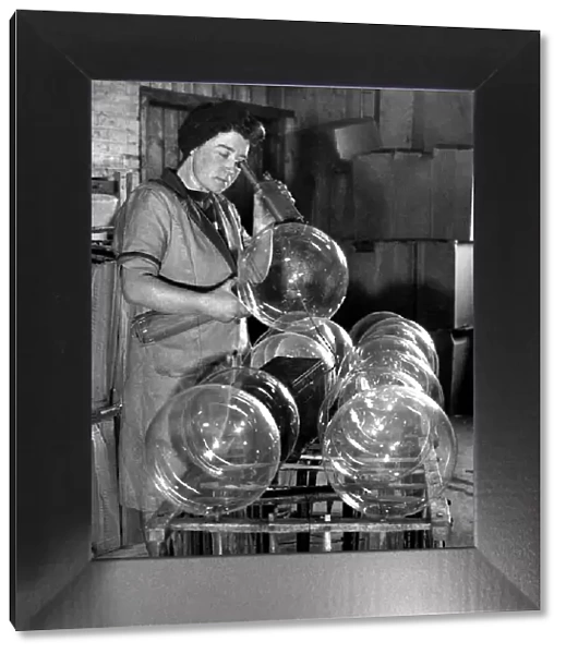 Testing beacon light bulbs at the Lemington Glass Works Ltd, Lemington